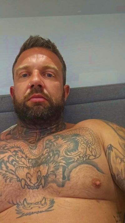 Tattedmuscle1 from United Kingdom